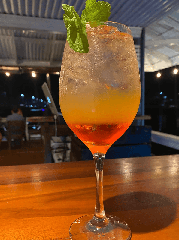 Captain Jack's signature piña colada with fresh garnish