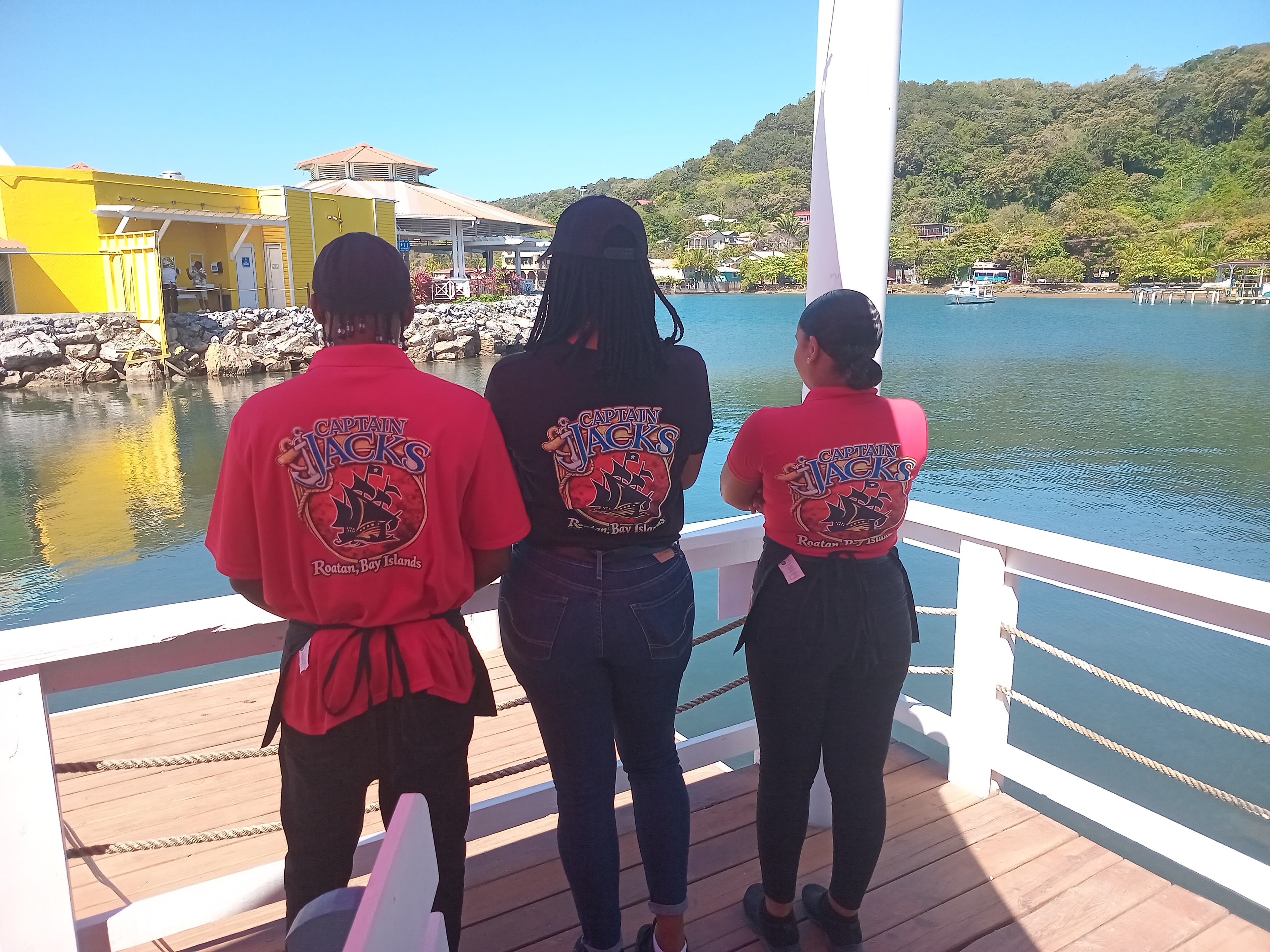 Captain Jack's staff overlooking the bay in branded pirate shirts